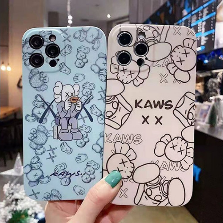 カウズ ブランドiphone12/12pro max/12 mini/12 pro maxケース ハンドバンド付き 韓国風 ホルダー付 KAWS 個性潮 iphone x/xr/xs/xs maxケース 落下防止 ファッション ins風 iphone 11/11 pro/11 pro maxケース かわいい iphone x/8/7 plusケース大人気