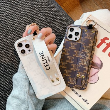 CELINE セリーヌ iPhone13pro/13pro max/13ケース ベルト付き 持ちやすい ブランド iphone12pro max/12pro/12カバー 落下保護 おしゃれ  アイフォン11pro max/11pro/11ケース シンプル 高級感 レディース メンズ