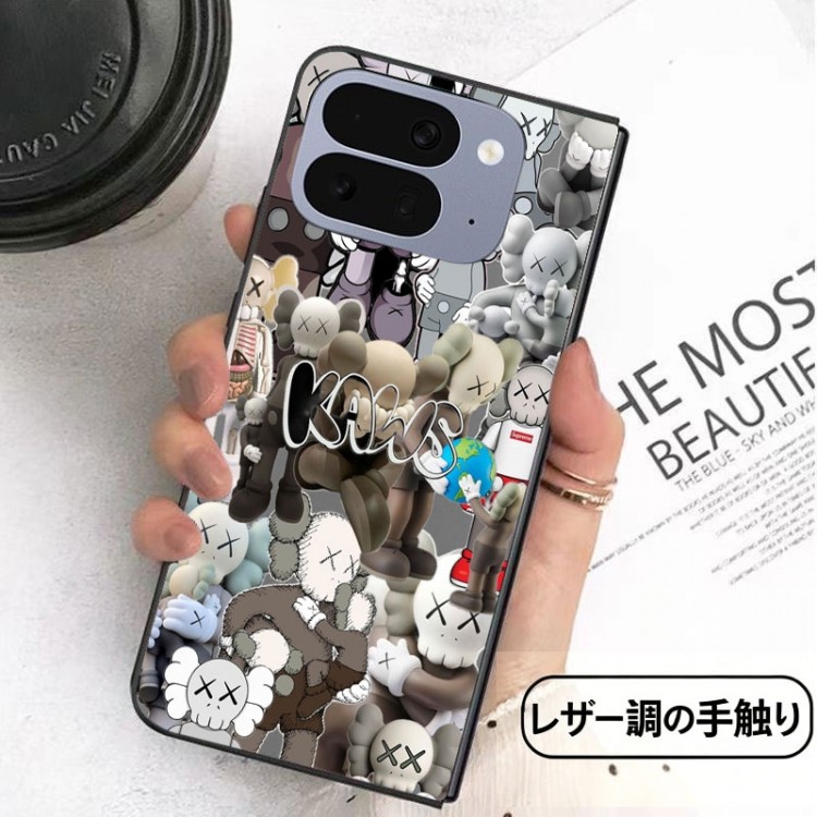 Kaws カウズアイフォン ultra fold 2026ブランドケースメンズブランドギャラクシーz flip 8 7 6 4 5 fold6 5 4 3 7 8スマホカバースムーズ高級感 Google Pixel Pro 11 10 9 foldケースハイブランドハイブランドGalaxy z flip 5 4 3 6 7 8携帯ケースビジネス
