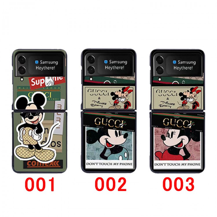 グッチ Disney ギャラクシー Z Flip4スマホケース かわいい 漫画柄 ブランド Gucci Galaxy z flip3カバー 耐衝撃レザー Galaxy Z Flip4ケースカバー 着脱安い 軽量 Samsung ゼットフリップ3ケース 放熱性よい ファッション 人気 メンズ レディース