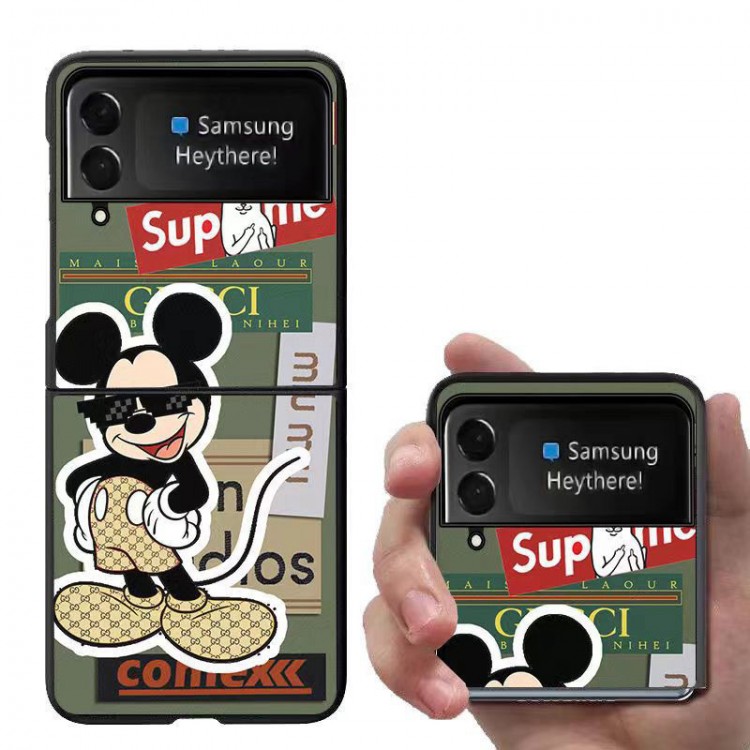 グッチ Disney ギャラクシー Z Flip4スマホケース かわいい 漫画柄 ブランド Gucci Galaxy z flip3カバー 耐衝撃レザー Galaxy Z Flip4ケースカバー 着脱安い 軽量 Samsung ゼットフリップ3ケース 放熱性よい ファッション 人気 メンズ レディース