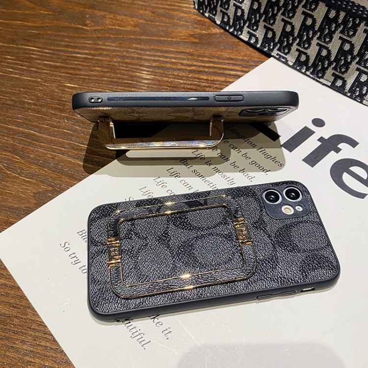 Coach IPHONE14pro max/14pro/14plus/14ケース ハンドル 持ち運び安い コーチ アイフォン13pro/13/13pro maxケースブランド 定番CC柄 ファッション GALAXY S22/S22ultra/S22+/A53/A33携帯カバー レンズ保護 耐衝撃