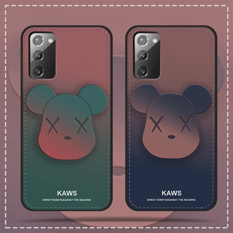 ブランド Kaws アイフォン14pro/13pro max/13pro/13革カバーファッション 放熱性よい カウズ ギャラクシーs22/s21ultra/s20+/note20/A53ケース 高品質 フィット Xperia 5iv/5iii/1iii/10iiiスマホケース 耐衝撃 創意グラデーション設計 メンズ レディース 