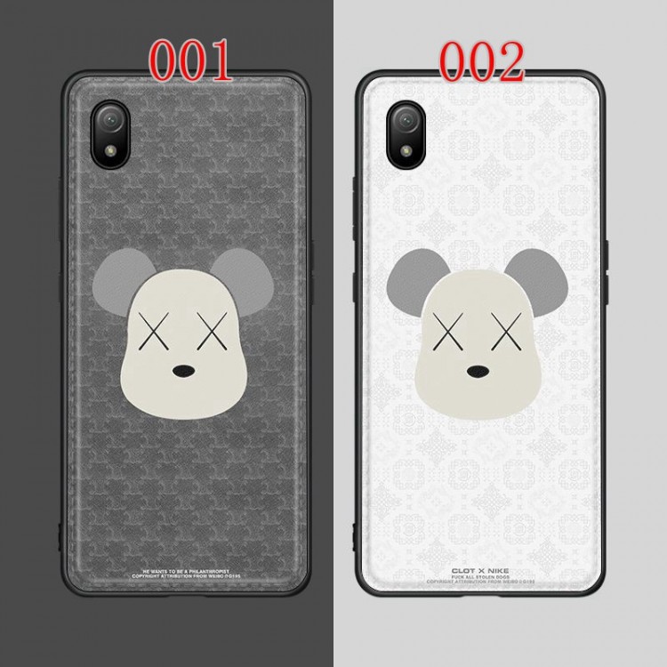 カウズ iPhone14pro/13mini/12pro maxケースブランド 高級革 オシャレ Kaws ギャラクシー S22+/S22ultra/A53/A33携帯カバー 全面保護 キズ防止 XPERIA 1IV/ace iii//5iv/5iii/10iii/ケース スリム 軽量 ファッション 男女兼用